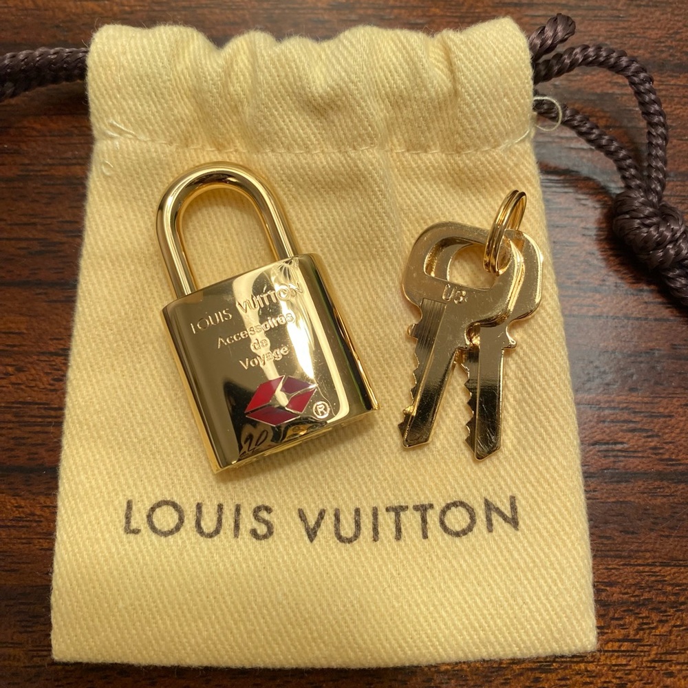 Louis Vuitton Gold Padlock and Key Set
